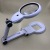 New 3b-1e Folding Handheld Desktop 18 LED Lights Magnifying Glass with Mother-Baby Magnifying Glass Gift Magnifying Glass for the Elderly