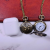 New Medium Retro Pocket Watch Green Bronze Flip Rose Lanyard Watch Quartz Watch Wholesale