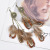 Fashion New Bohemian Style Feather Tassel Metal Ear Hook Flower Cutout Long Earrings Fashionable Ethnic Style