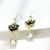 Ladies Fashion Camellia Earrings Long Face Slimming Tassel Earrings Bright Crystal French Minority Fashionable Earrings