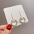 Baroque Pearl Earrings Women's New Fashion Earrings Simple Cold Style Flower Ear Hook Short Graceful Earrings