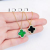 New Four-Leaf Clover Necklace Female Online Influencer Diamond-Embedded Elegant Green Necklace Niche Clavicle Chain Factory Direct Sales Wholesale