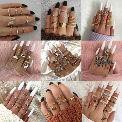 Europe and America Cross Border New Gossip Snake Leaf Ring Flower Love Butterfly Pearl Chain Knuckle Ring Suit