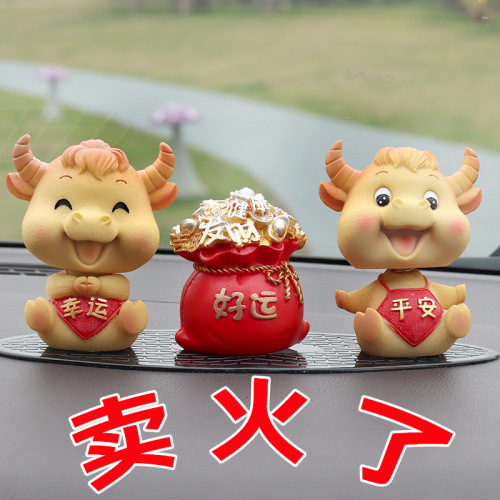 calf mascot year of ox car decoration moving head cow car center console high-end car interior decoration supplies cute cow