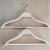Solid wood hanger for women's clothes and children's wooden traceless hanger trouser rack