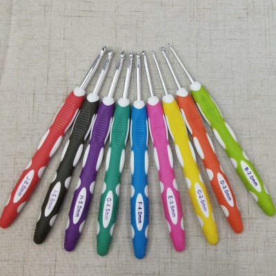 Factory Direct Sales Weaving Tools TPR Mixed ABS Two-Color Handle Aluminum Crochet Hook a Set of 9 Pieces Pu Bag Packaging