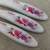 Factory Direct Sales Knitting Tools New Small Curved Handle Printing Thick Rose Red Aluminum Crochet Set of 8 Pieces