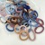 Tiktok Hot Sale 100 Bags Highly Elastic Hair Rope Seam Rubber Bands Women's No Hurt Hair Towel Ring Hairtie