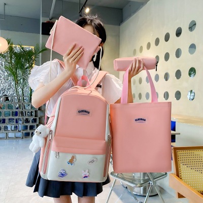 New Four-Piece Backpack Large Capacity Junior High School High School Student Schoolbag Manufacturer
