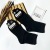 Men's Mid-Calf Solid Color Socks Wholesale Autumn and Winter New Sweat-Absorbent Breathable Leisure Sports Socks Seven-Day Cotton Socks