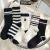 Women's Socks Autumn and Winter New Tube Socks Cute Black and White Flower Ins Trendy All-Matching Cotton Socks Factory Wholesale