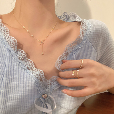Sweet Bow Pearl Tassel Pendant Female Niche Design Fashion Short Necklace Temperament Wild Simple Necklace