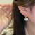 Trade Affordable Luxury Style Mermaid Pearl Ear Clip Earrings Niche Design Advanced Earrings Earrings New Fashion Women
