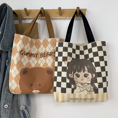 Wholesale Cartoon Canvas Bag Spot Hand-Held One-Shoulder Bento Student Shopping Gift Bag Xiaohongshu Foreign Trade Cotton Women's Bag