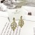 Korean Hollow Opal Leaves Rhinestone Earrings Female New Design Sense Niche Sterling Silver Needle Thin-Looking Earrings Tide