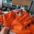 Shandong Gaomi Factory Direct Sales Seven-Needle Natural White Orange Large Board Latex Gummed Work Gloves