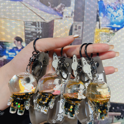 cartoon oil floating astronaut keychain quicksand drift bottle key chain female backpack package pendant small gift wholesale